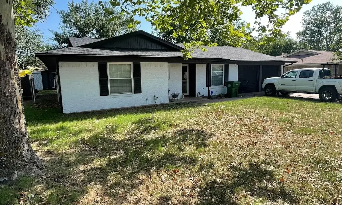 Professional roofing crew working on a residential roof in Bear Creek